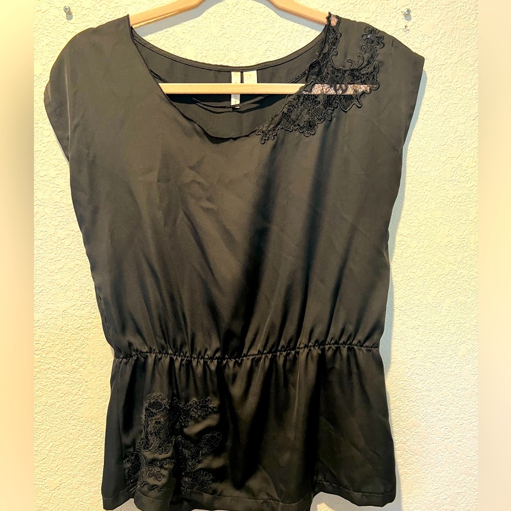 Lauren Conrad Silk top in size small.